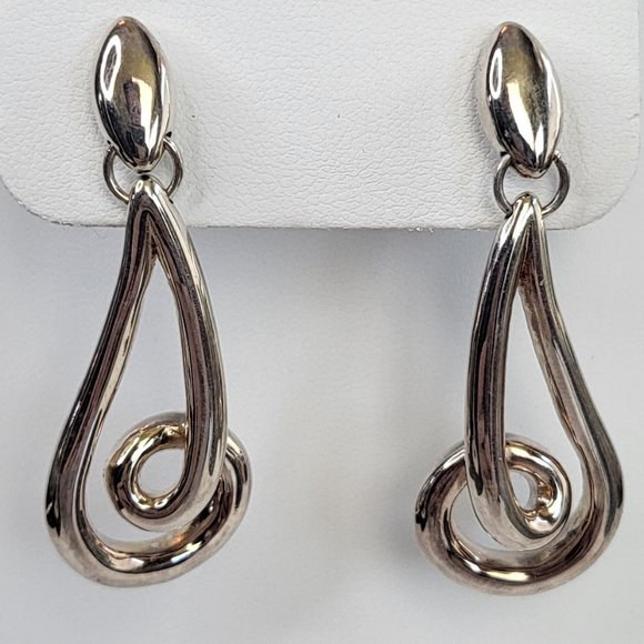 Jewelry - *4/$20* Silver tone swirly shape long drop earrings
